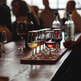 flight of wine on a bar